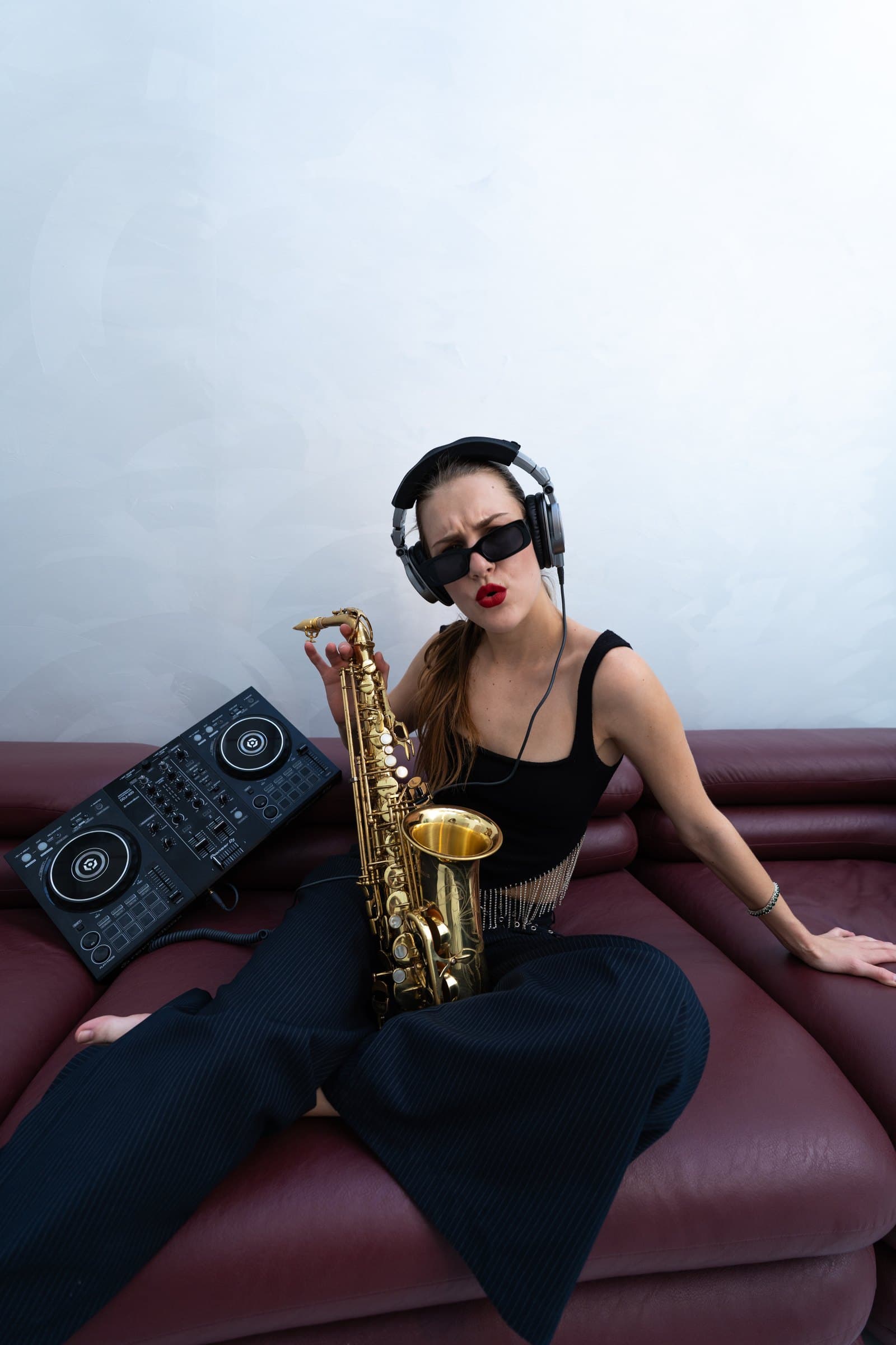 Violetta seated with DJ controller